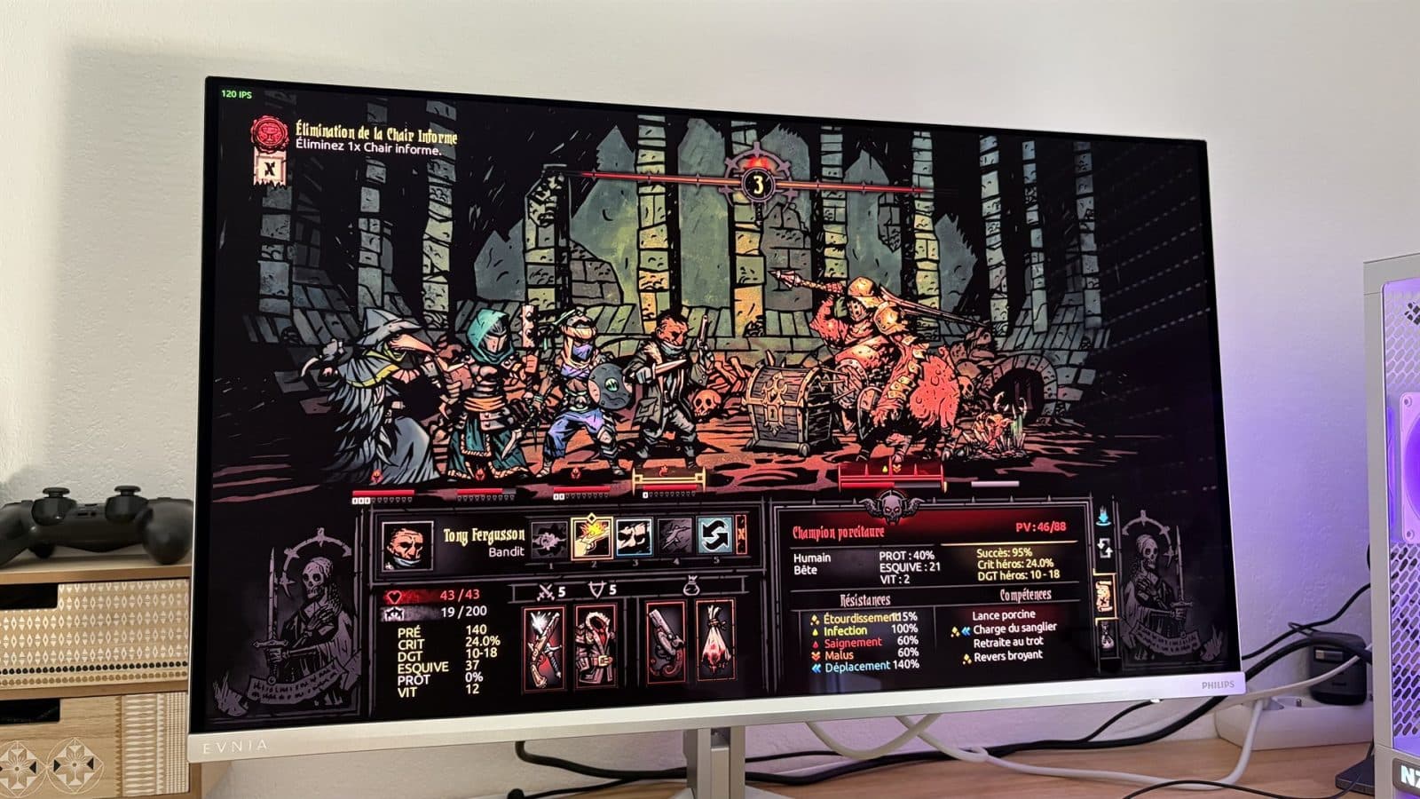 Partie de Darkest Dungeon, un jeu sombre ou on voit bien la profondeur des noirs et les couleurs vives qui ressorte parfaitement au centre
